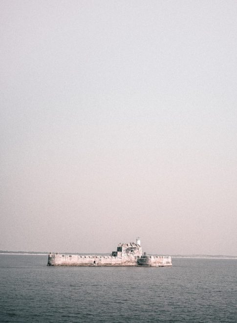 a large boat floating on top of a large body of water